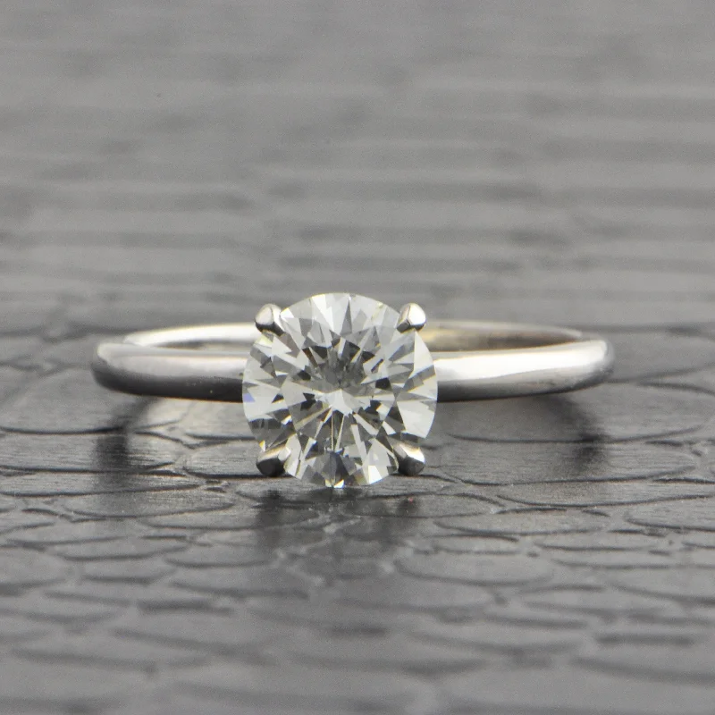 Solitaire diamond engagement ring with a platinum setting for a classic and elegant lookGIA 1.24 ct. Round Brilliant Cut Diamond Engagement Ring Solitaire diamond engagement ring with a platinum setting for a classic and elegant lookGIA 1.24 ct. Round Brilliant Cut Diamond Engagement Ring
