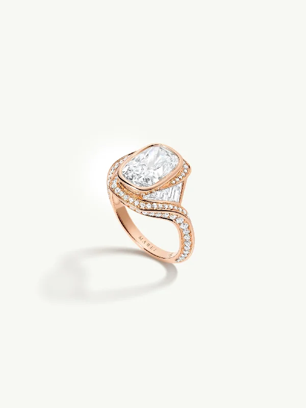 Engagement - Inspired Women's Rings with a Halo of Small DiamondsMaat Engagement Ring With Brilliant Cushion-Cut Diamond, Baguettes & Pavé-Set White Diamonds in 18K Rose Gold Engagement - Inspired Women's Rings with a Halo of Small DiamondsMaat Engagement Ring With Brilliant Cushion-Cut Diamond, Baguettes & Pavé-Set White Diamonds in 18K Rose Gold