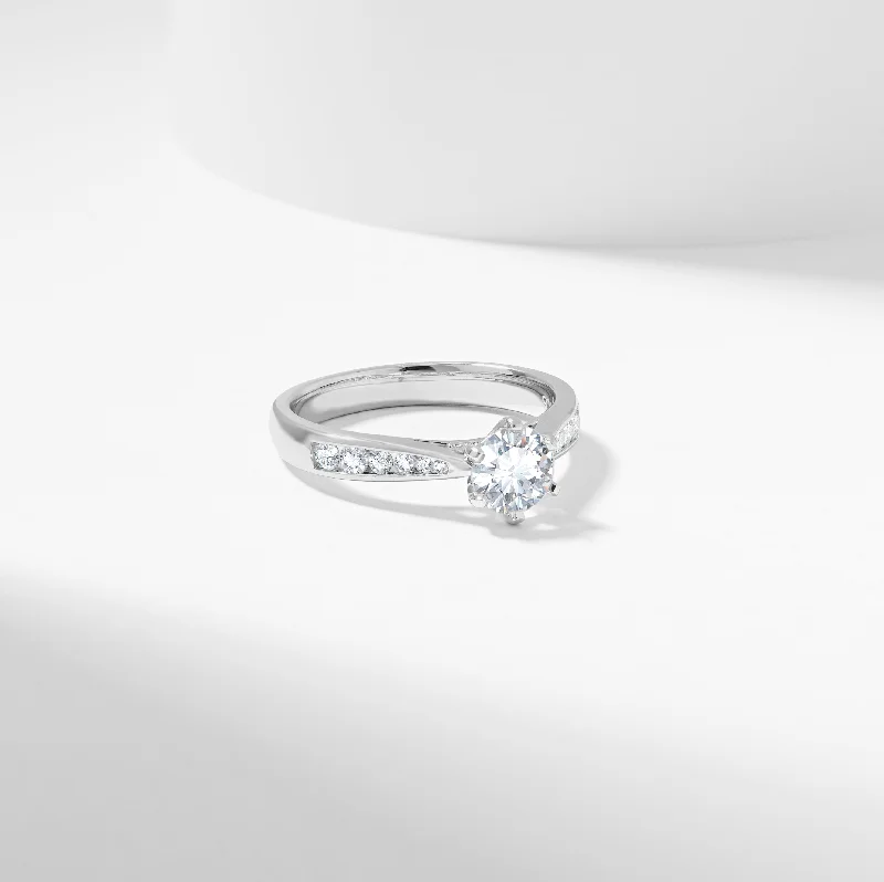 Solitaire diamond engagement ring with a platinum setting for a classic and elegant lookRound Brilliant Lab Grown Diamond Solitaire With Shoulder Accents Engagement Ring 1.0tdw 0.8ct Solitaire diamond engagement ring with a platinum setting for a classic and elegant lookRound Brilliant Lab Grown Diamond Solitaire With Shoulder Accents Engagement Ring 1.0tdw 0.8ct