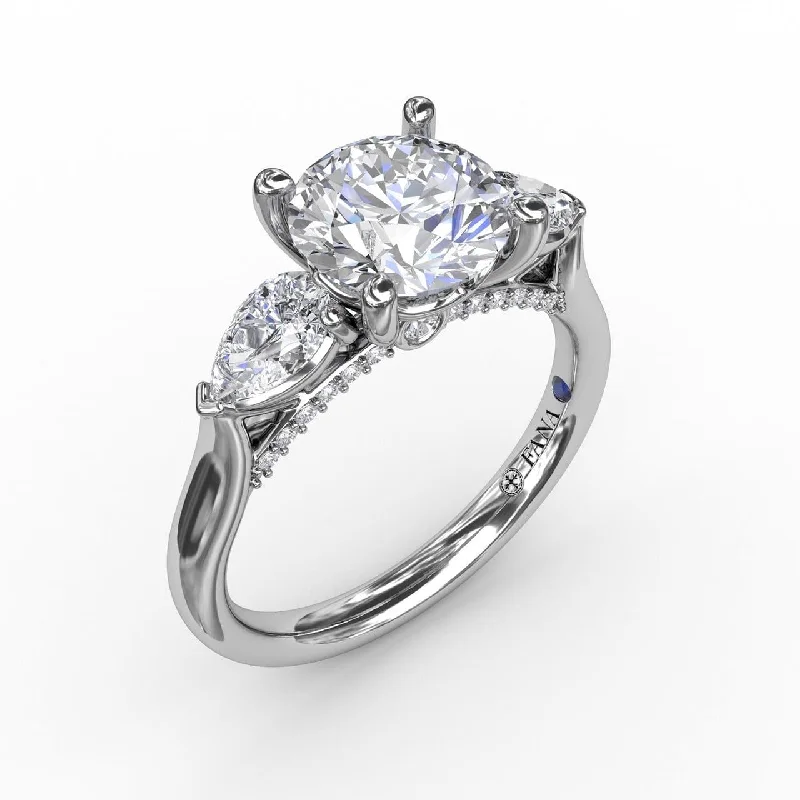 Men's Tanzanite Engagement Rings in Palladium with a Three - Stone ArrangementClassic Three-Stone Engagement Ring With Pear-Shape Side Diamonds Men's Tanzanite Engagement Rings in Palladium with a Three - Stone ArrangementClassic Three-Stone Engagement Ring With Pear-Shape Side Diamonds