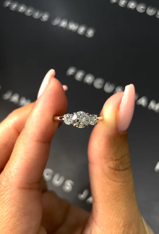Marquise - cut diamond engagement ring with a split - shank band in platinum0.5 Carat Natural Trilogy Engagement Ring - Round Diamond in 18k White Gold Setting