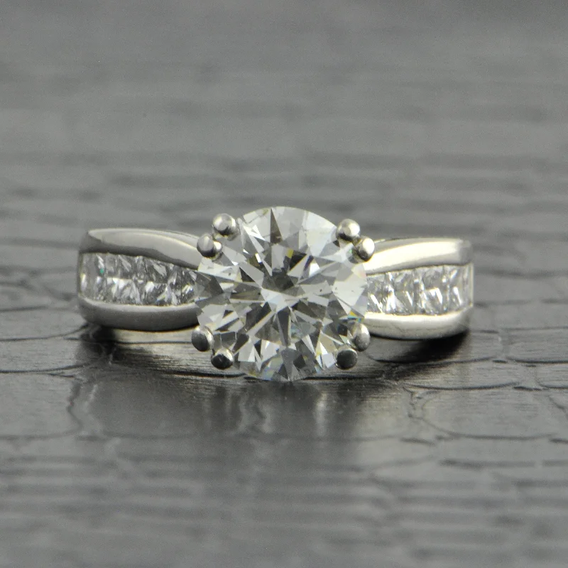 Three - stone diamond engagement ring in rose gold, symbolizing past, present, and future2.06 ct. Round Brilliant Cut Diamond Engagement Ring by Scott Kay Three - stone diamond engagement ring in rose gold, symbolizing past, present, and future2.06 ct. Round Brilliant Cut Diamond Engagement Ring by Scott Kay