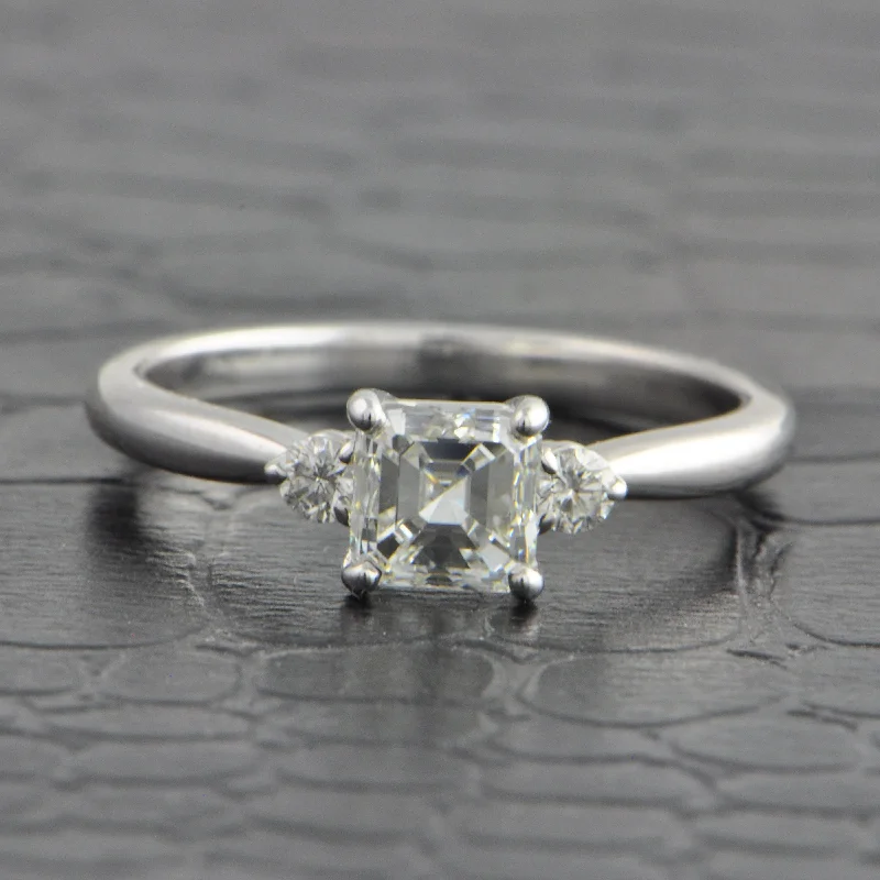 Round - cut diamond engagement ring with a twisted band design in 14K white goldGIA 1.0 ct. Asscher Cut Diamond Engagement Ring in White Gold Round - cut diamond engagement ring with a twisted band design in 14K white goldGIA 1.0 ct. Asscher Cut Diamond Engagement Ring in White Gold