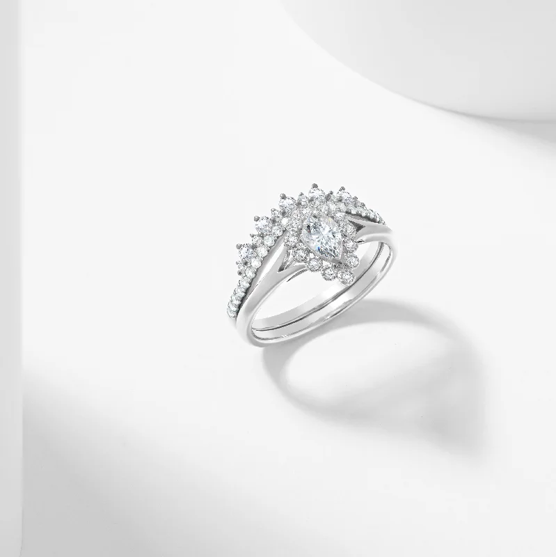 Halo diamond engagement ring in 18K white gold with a center oval - cut stoneGold Pear Moissanite Halo Tiara Bridal Set 0.9tdw Halo diamond engagement ring in 18K white gold with a center oval - cut stoneGold Pear Moissanite Halo Tiara Bridal Set 0.9tdw