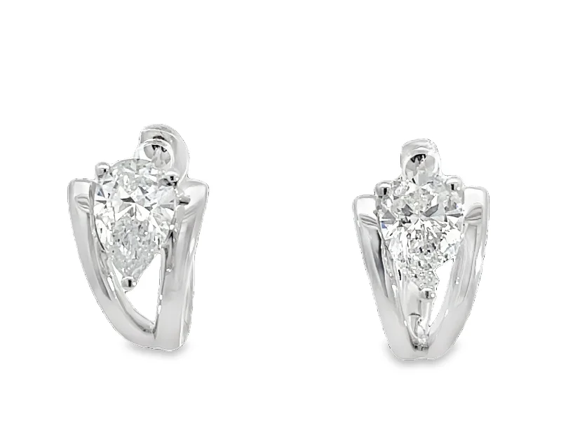 Radiant - cut diamond engagement ring with a bezel - set center stone in 18K yellow goldLAB GROWN PEAR DIAMONDS (2) 1.40CTW HUGGIE EARRINGS Radiant - cut diamond engagement ring with a bezel - set center stone in 18K yellow goldLAB GROWN PEAR DIAMONDS (2) 1.40CTW HUGGIE EARRINGS