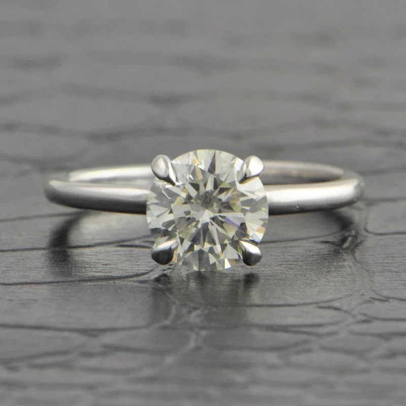 Solitaire diamond engagement ring with a platinum setting for a classic and elegant lookGIA 1.55 ct. Round Brilliant Cut Diamond Engagement Ring in White Gold Solitaire diamond engagement ring with a platinum setting for a classic and elegant lookGIA 1.55 ct. Round Brilliant Cut Diamond Engagement Ring in White Gold