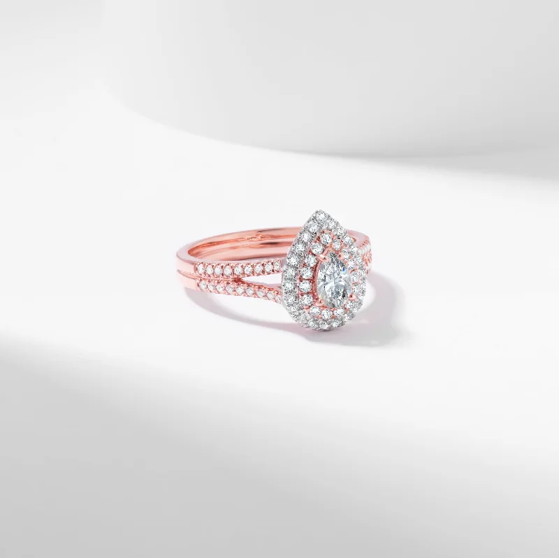 Pink diamond engagement ring in a rose - gold band with white - gold accentsPear Diamond Double Halo Engagement Ring 1.0tdw Pink diamond engagement ring in a rose - gold band with white - gold accentsPear Diamond Double Halo Engagement Ring 1.0tdw