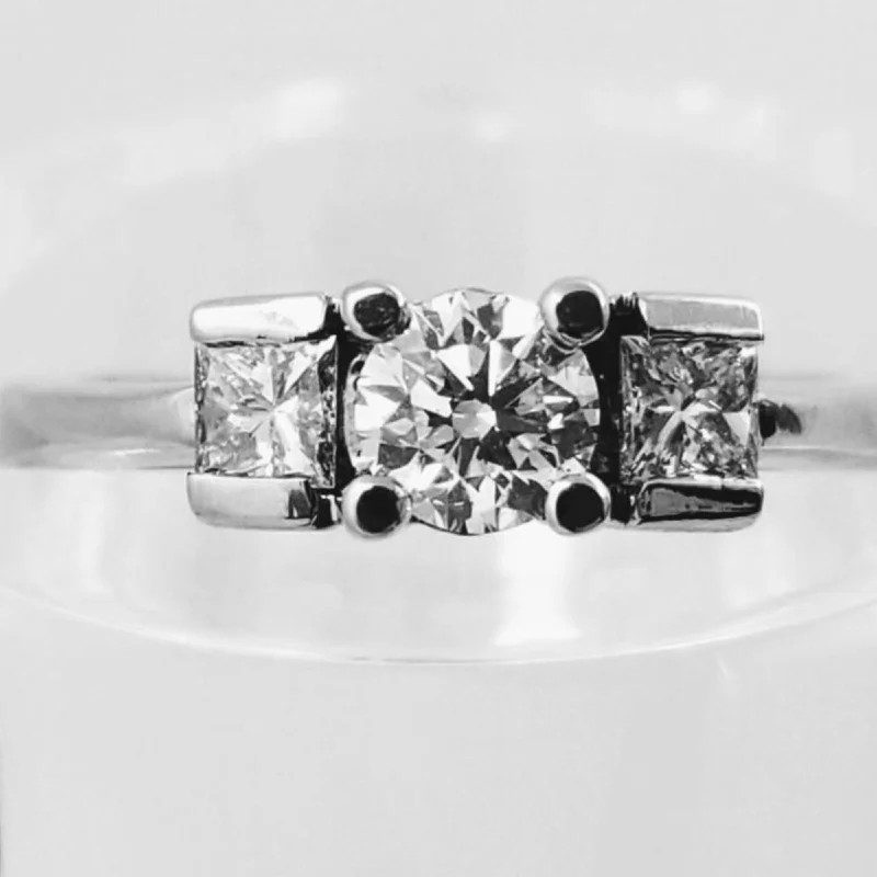 Engagement - Inspired Women's Rings with a Halo of Small DiamondsWhite Gold Diamond Trilogy Combination Ring Engagement - Inspired Women's Rings with a Halo of Small DiamondsWhite Gold Diamond Trilogy Combination Ring