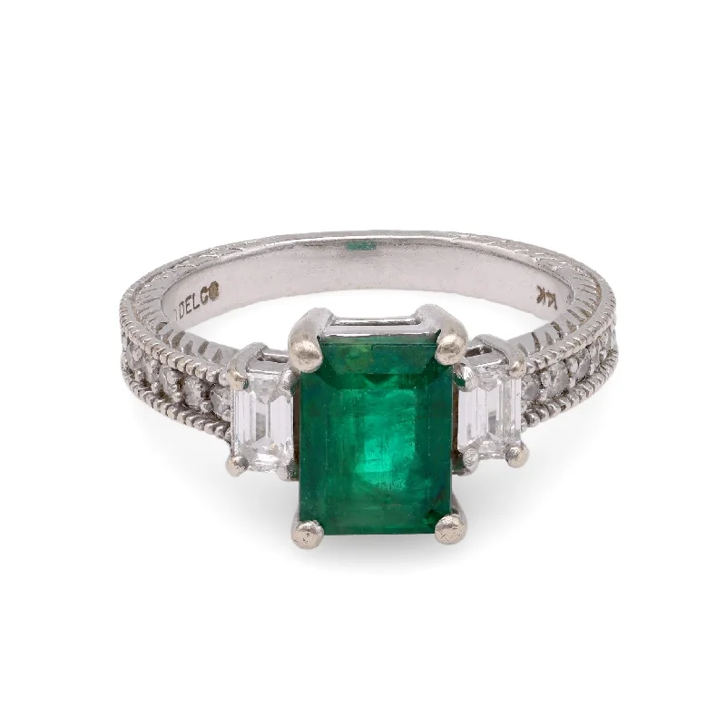 Halo diamond engagement ring in 18K white gold with a center oval - cut stoneEmerald Diamond White Gold Engagement Ring Halo diamond engagement ring in 18K white gold with a center oval - cut stoneEmerald Diamond White Gold Engagement Ring