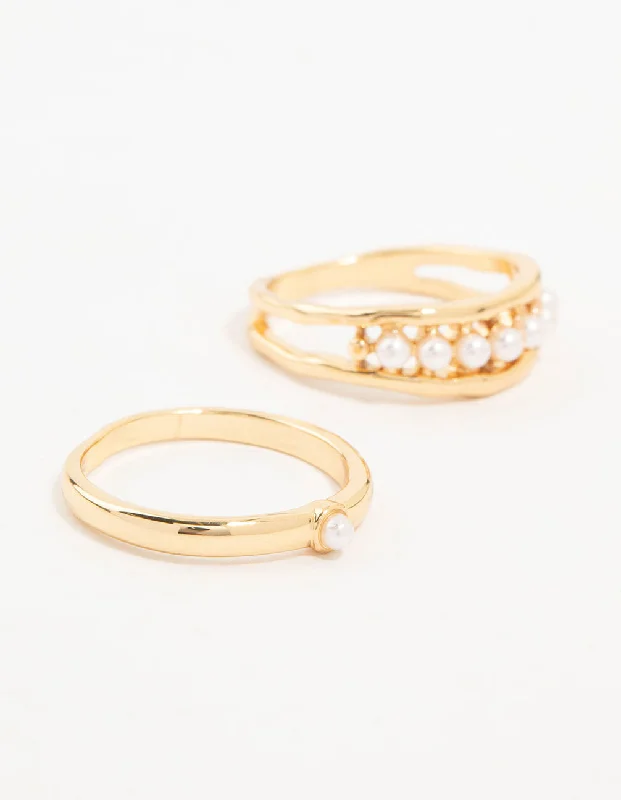 Magnetic Fashion Rings in Stainless Steel with a Modern, Interlocking DesignGold Plated Petite Pearl Stacking Rings 2-Pack Magnetic Fashion Rings in Stainless Steel with a Modern, Interlocking DesignGold Plated Petite Pearl Stacking Rings 2-Pack
