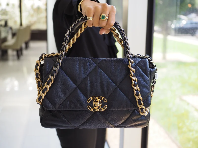 Emerald - cut diamond engagement ring set in a modern titanium bandPre-Owned Chanel 19 Large Quilted Shoulder Bag Goat Skin Emerald - cut diamond engagement ring set in a modern titanium bandPre-Owned Chanel 19 Large Quilted Shoulder Bag Goat Skin