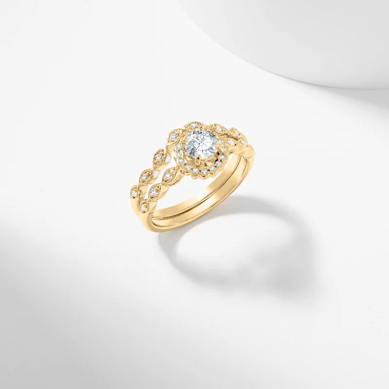 Emerald - cut diamond engagement ring set in a modern titanium bandRound Brilliant Diamond Scallop Halo Bridal Set 0.7tdw Emerald - cut diamond engagement ring set in a modern titanium bandRound Brilliant Diamond Scallop Halo Bridal Set 0.7tdw