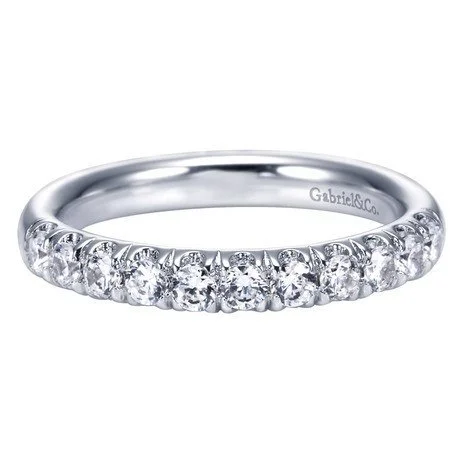 Men's Black Onyx Engagement Rings Set in Titanium for a Modern and Bold LookFrench Pave Diamond Band .50 Cttw 14K White Gold Men's Black Onyx Engagement Rings Set in Titanium for a Modern and Bold LookFrench Pave Diamond Band .50 Cttw 14K White Gold