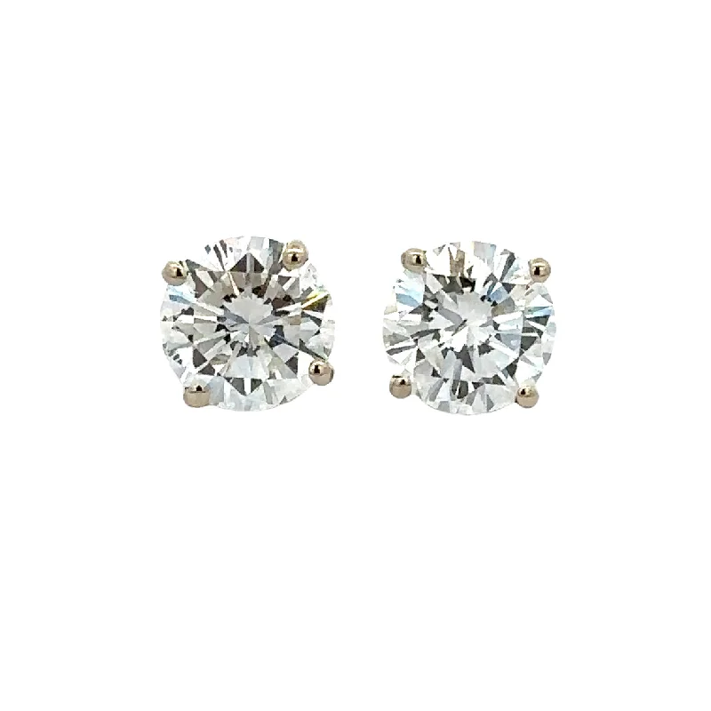 Emerald - cut diamond engagement ring set in a modern titanium band3.0 CTW Diamond Stud Earrings in White Gold Emerald - cut diamond engagement ring set in a modern titanium band3.0 CTW Diamond Stud Earrings in White Gold