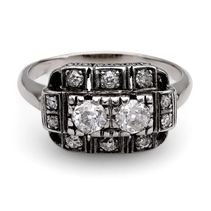 Round - cut diamond engagement ring with a twisted band design in 14K white gold14k White Gold Diamond Ring Round - cut diamond engagement ring with a twisted band design in 14K white gold14k White Gold Diamond Ring