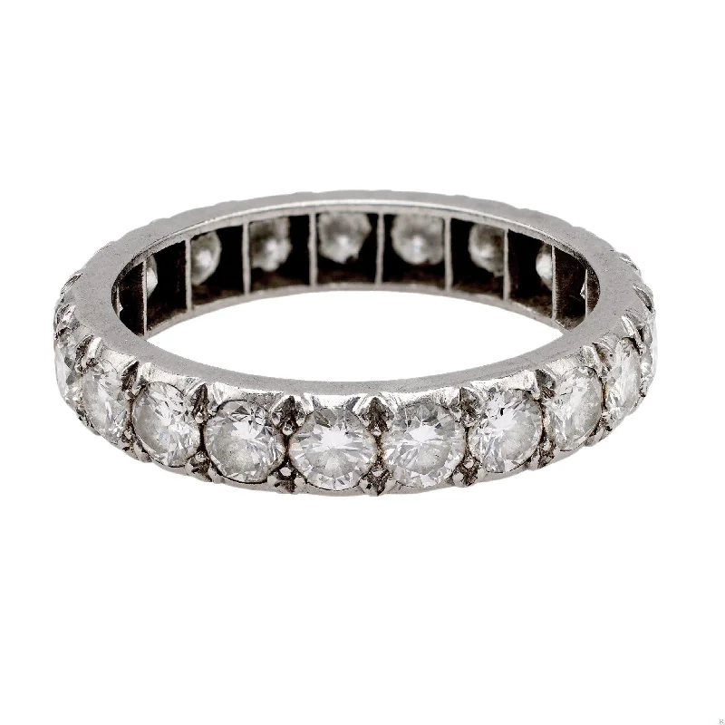 Ruby and diamond engagement ring with a halo of diamonds in 14K red goldMid-Century French Diamond Platinum Eternity Band Ruby and diamond engagement ring with a halo of diamonds in 14K red goldMid-Century French Diamond Platinum Eternity Band