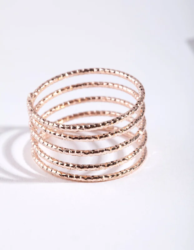 Adjustable Fashion Rings in Leather and Brass with a Tribal - Inspired DesignRose Gold Diamond Cut Spiral Ring Adjustable Fashion Rings in Leather and Brass with a Tribal - Inspired DesignRose Gold Diamond Cut Spiral Ring