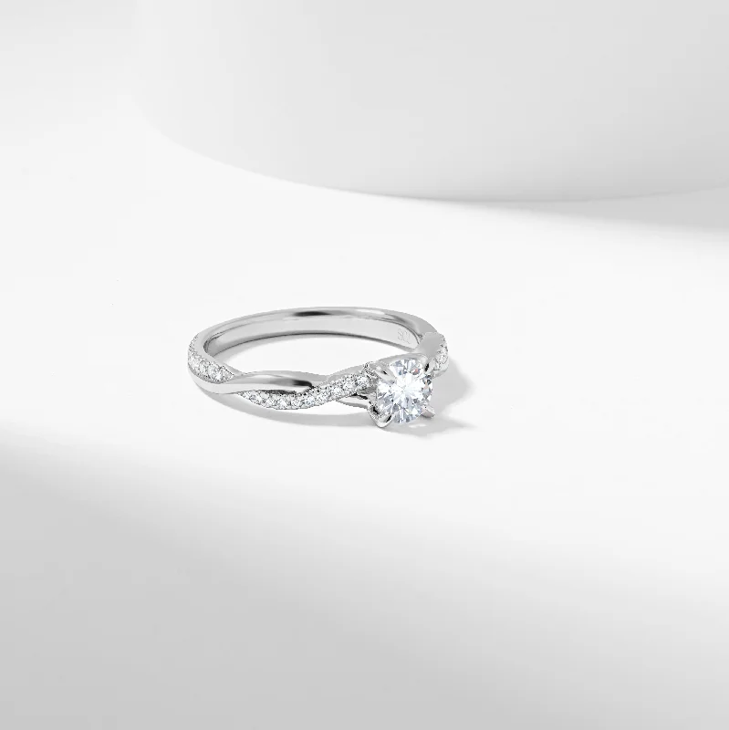 Three - stone diamond engagement ring in rose gold, symbolizing past, present, and futureRound Brilliant Moissanite Entwined Band Engagement Ring 0.65tdw Three - stone diamond engagement ring in rose gold, symbolizing past, present, and futureRound Brilliant Moissanite Entwined Band Engagement Ring 0.65tdw