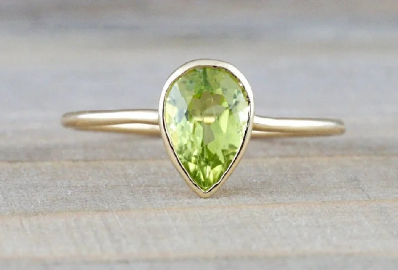Men's leather - wrapped rings for a rustic charmPear Green Peridot Shape Bezel Band Ring Men's leather - wrapped rings for a rustic charmPear Green Peridot Shape Bezel Band Ring