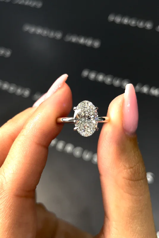 Pear - shaped diamond engagement ring with side baguette diamonds in 18K gold2 Carat Natural Solitaire Engagement Ring - Oval Diamond in 18k White Gold Setting Pear - shaped diamond engagement ring with side baguette diamonds in 18K gold2 Carat Natural Solitaire Engagement Ring - Oval Diamond in 18k White Gold Setting