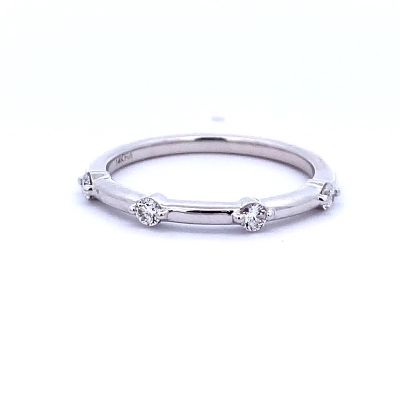Round - cut diamond engagement ring with a twisted band design in 14K white goldFour Diamond Band in White Gold Round - cut diamond engagement ring with a twisted band design in 14K white goldFour Diamond Band in White Gold