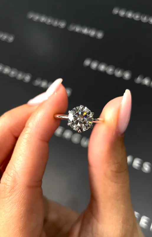 Marquise - cut diamond engagement ring with a split - shank band in platinum2 Carat Natural Solitaire Engagement Ring - Round Diamond in 18k White Gold Setting Marquise - cut diamond engagement ring with a split - shank band in platinum2 Carat Natural Solitaire Engagement Ring - Round Diamond in 18k White Gold Setting