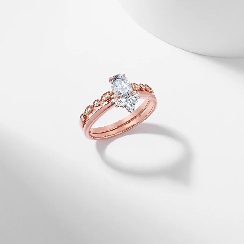 Pink diamond engagement ring in a rose - gold band with white - gold accentsOval Lab Grown Diamond Tiara Bridal Set 0.97tdw Pink diamond engagement ring in a rose - gold band with white - gold accentsOval Lab Grown Diamond Tiara Bridal Set 0.97tdw