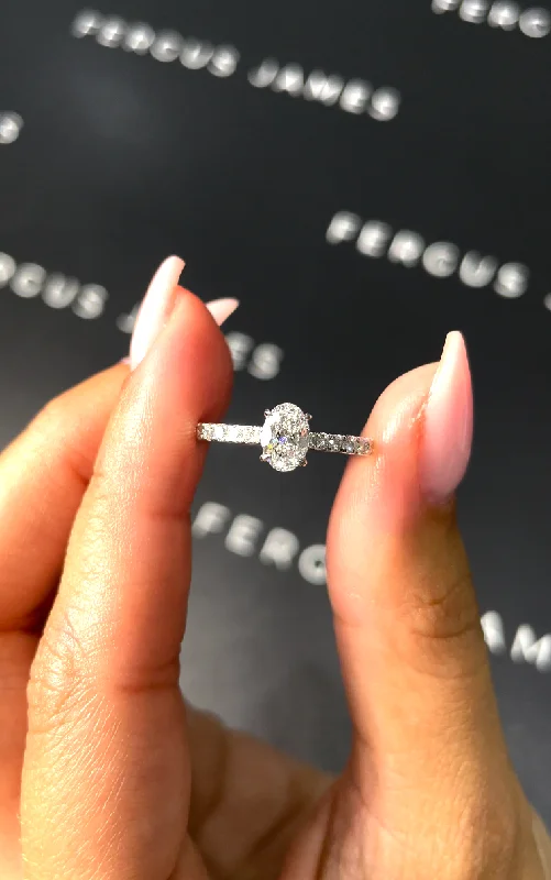 Radiant - cut diamond engagement ring with a bezel - set center stone in 18K yellow gold0.5 Carat Natural Diamond Band Engagement Ring - Oval Diamond in 18k White Gold Setting Radiant - cut diamond engagement ring with a bezel - set center stone in 18K yellow gold0.5 Carat Natural Diamond Band Engagement Ring - Oval Diamond in 18k White Gold Setting