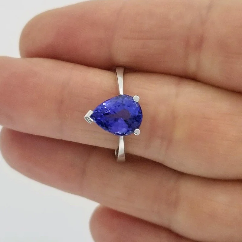 Diamond - Encrusted Women's Rings for Special Occasions in 18K GoldWhite Gold Pear Shaped Tanzanite Ring Diamond - Encrusted Women's Rings for Special Occasions in 18K GoldWhite Gold Pear Shaped Tanzanite Ring