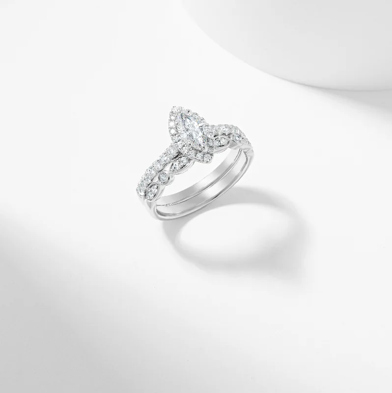 Emerald and diamond engagement ring in a vintage - inspired platinum bandMarquise Diamond Halo Bridal Set 1.0tdw Emerald and diamond engagement ring in a vintage - inspired platinum bandMarquise Diamond Halo Bridal Set 1.0tdw