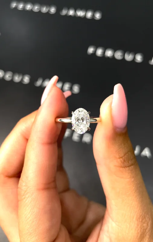 Emerald - cut diamond engagement ring set in a modern titanium band1.5 Carat Natural Solitaire Engagement Ring - Oval Diamond in 18k White Gold Setting Emerald - cut diamond engagement ring set in a modern titanium band1.5 Carat Natural Solitaire Engagement Ring - Oval Diamond in 18k White Gold Setting