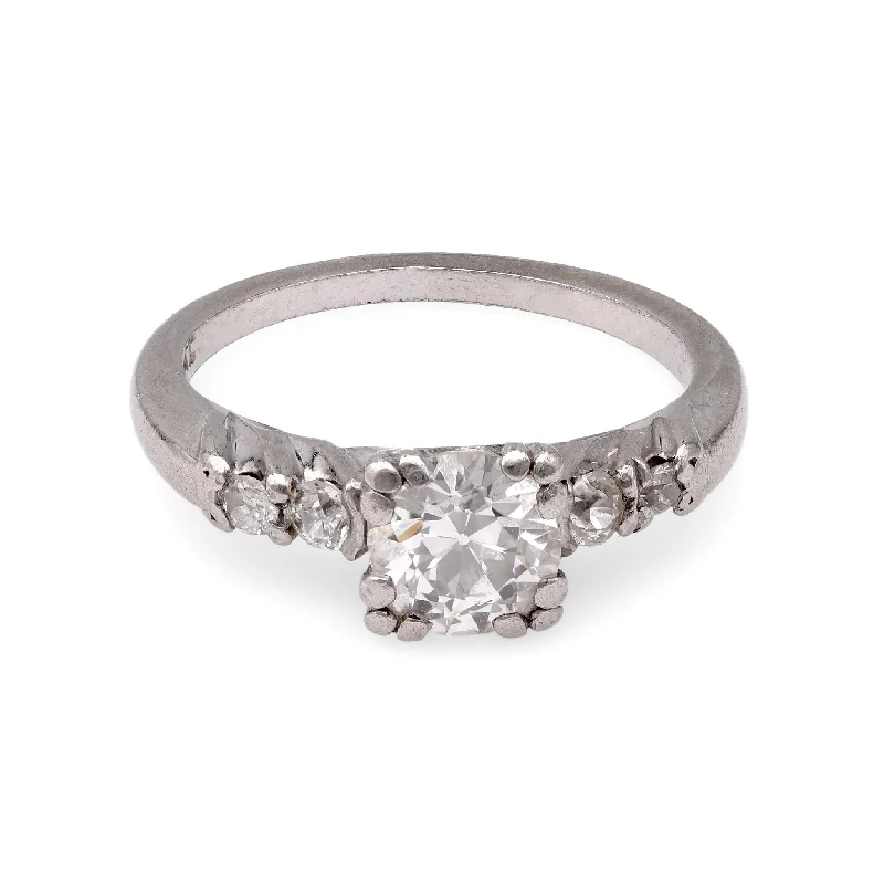 Round - cut diamond engagement ring with a twisted band design in 14K white goldLate Art Deco Diamond Ring Round - cut diamond engagement ring with a twisted band design in 14K white goldLate Art Deco Diamond Ring