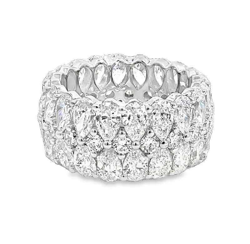 Emerald - cut diamond engagement ring set in a modern titanium bandLAB GROWN PEAR & ROUND DIAMONDS 8.48CTW PRONG SET ETERNITY BAND Emerald - cut diamond engagement ring set in a modern titanium bandLAB GROWN PEAR & ROUND DIAMONDS 8.48CTW PRONG SET ETERNITY BAND