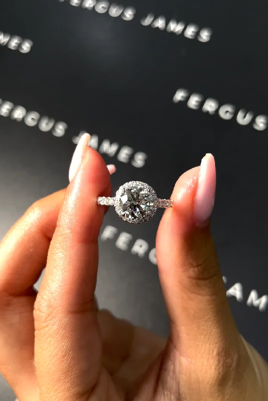 Cushion - cut diamond engagement ring with a halo of moissanite in a silver - plated band1.5 Carat Natural Halo Engagement Ring - Round Diamond in 18k White Gold Setting Cushion - cut diamond engagement ring with a halo of moissanite in a silver - plated band1.5 Carat Natural Halo Engagement Ring - Round Diamond in 18k White Gold Setting