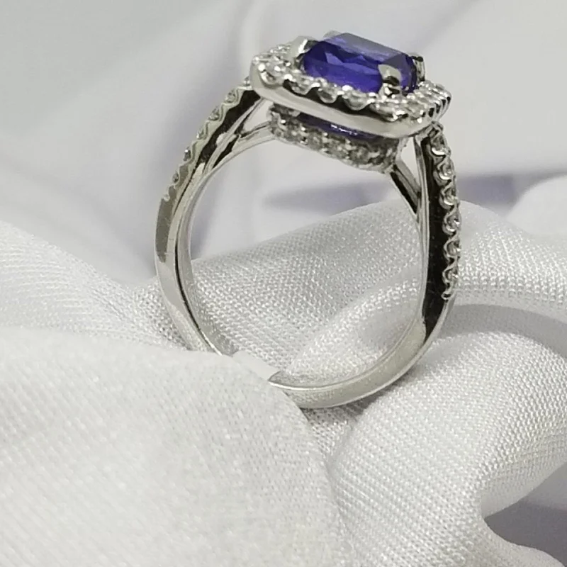 Engagement - Inspired Women's Rings with a Halo of Small DiamondsTwo Levels Halo Tanzanite Ring Engagement - Inspired Women's Rings with a Halo of Small DiamondsTwo Levels Halo Tanzanite Ring