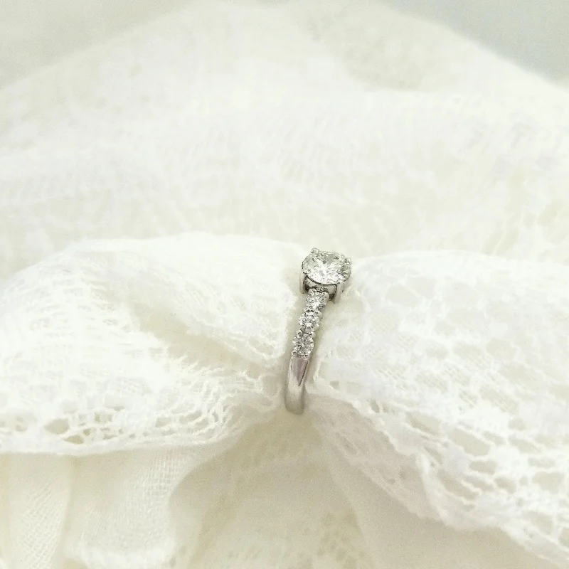 Floral - Patterned Women's Rings in 18K Yellow Gold for a Feminine LookEngagement Ring with Center Diamond & Side Diamonds Floral - Patterned Women's Rings in 18K Yellow Gold for a Feminine LookEngagement Ring with Center Diamond & Side Diamonds
