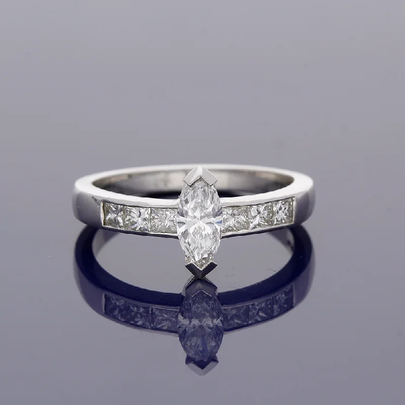 Men's Diamond Engagement Rings with Platinum Band and Halo Setting for a Luxury ProposalPlatinum 0.51ct Marquise Cut Diamond Solitaire Ring with Princess Cut Diamond Set Shoulders Men's Diamond Engagement Rings with Platinum Band and Halo Setting for a Luxury ProposalPlatinum 0.51ct Marquise Cut Diamond Solitaire Ring with Princess Cut Diamond Set Shoulders