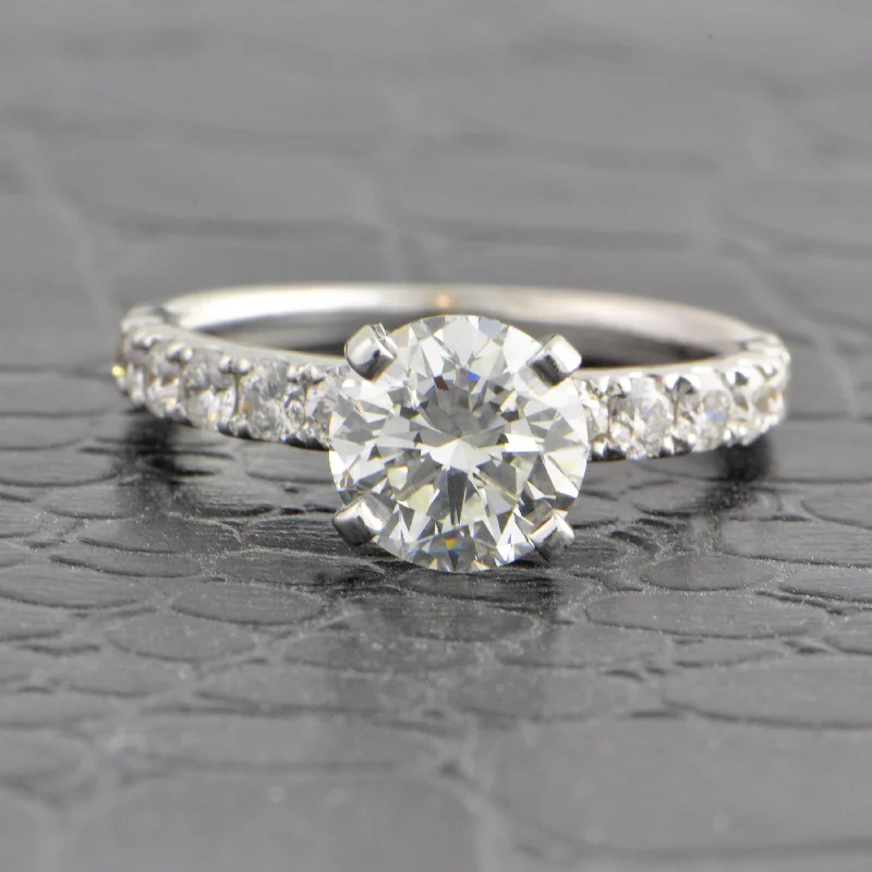 Radiant - cut diamond engagement ring with a bezel - set center stone in 18K yellow goldGIA 1.61 ct. Round Brilliant Cut Diamond Engagement Ring in White Gold Radiant - cut diamond engagement ring with a bezel - set center stone in 18K yellow goldGIA 1.61 ct. Round Brilliant Cut Diamond Engagement Ring in White Gold