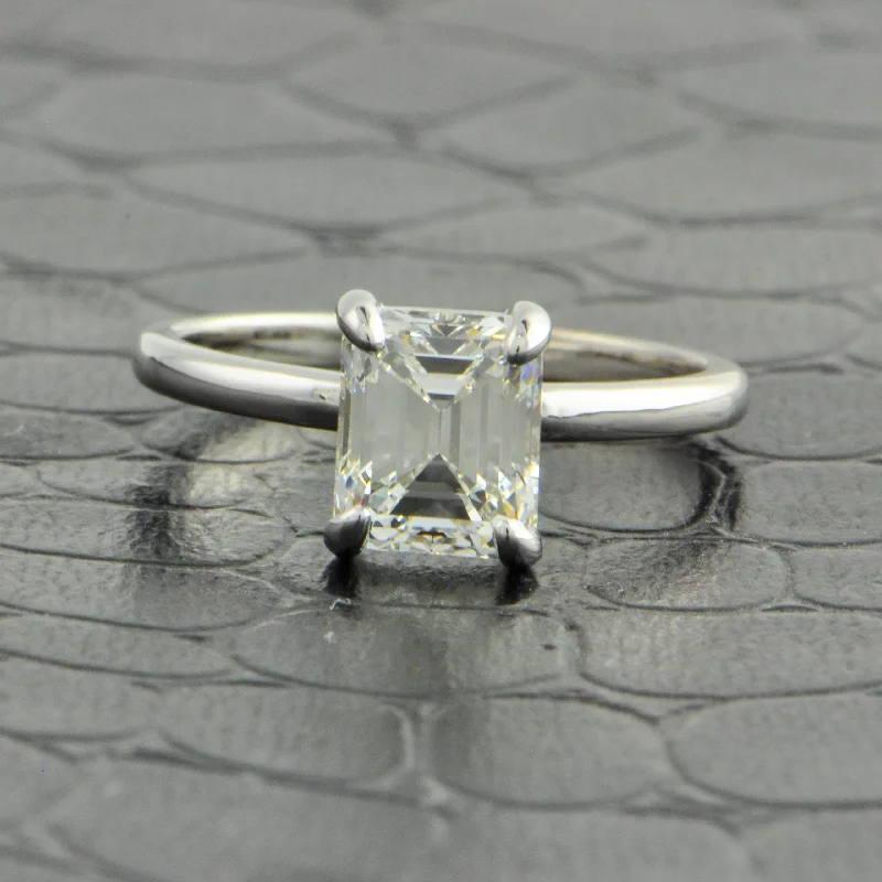 Princess - cut diamond engagement ring with a pavé - set band in platinumGIA 2.08 ct. Emerald Cut Diamond Engagement Ring in White Gold Princess - cut diamond engagement ring with a pavé - set band in platinumGIA 2.08 ct. Emerald Cut Diamond Engagement Ring in White Gold