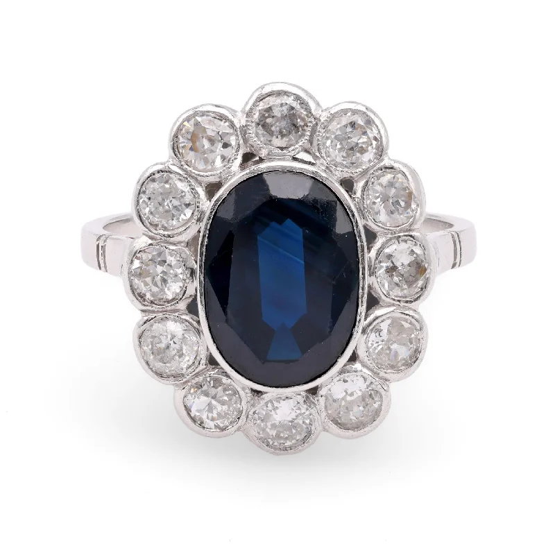 Pear - shaped diamond engagement ring with side baguette diamonds in 18K goldEdwardian 2.9 Carat Oval Cut Sapphire Diamond Platinum Cluster Ring Pear - shaped diamond engagement ring with side baguette diamonds in 18K goldEdwardian 2.9 Carat Oval Cut Sapphire Diamond Platinum Cluster Ring