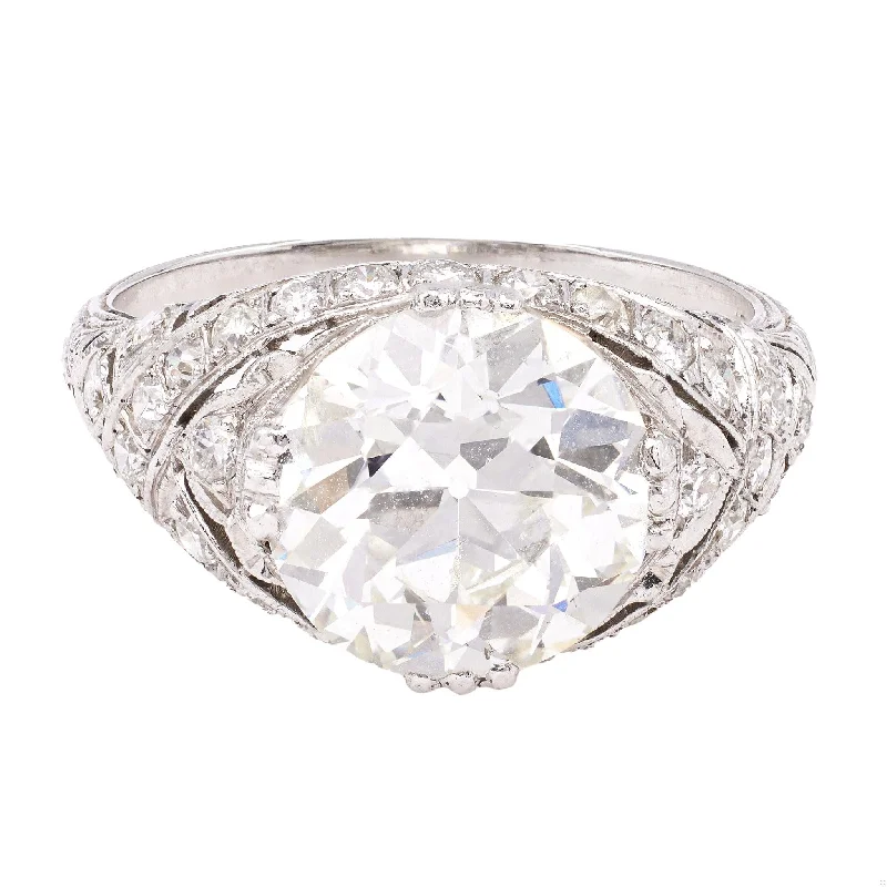 Halo diamond engagement ring in 18K white gold with a center oval - cut stoneEdwardian GIA 4.14 Carat Old European Cut Diamond Platinum Filigree Ring Halo diamond engagement ring in 18K white gold with a center oval - cut stoneEdwardian GIA 4.14 Carat Old European Cut Diamond Platinum Filigree Ring