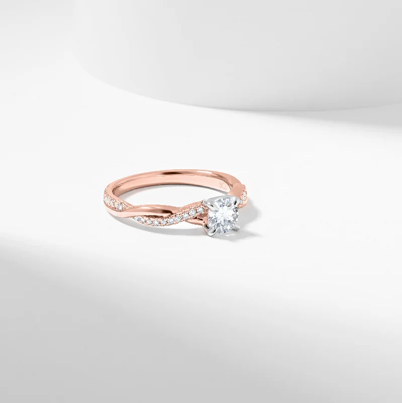Pear - shaped diamond engagement ring with side baguette diamonds in 18K goldRound Brilliant Lab Grown Diamond Entwined Band Engagement Ring 0.65tdw Pear - shaped diamond engagement ring with side baguette diamonds in 18K goldRound Brilliant Lab Grown Diamond Entwined Band Engagement Ring 0.65tdw