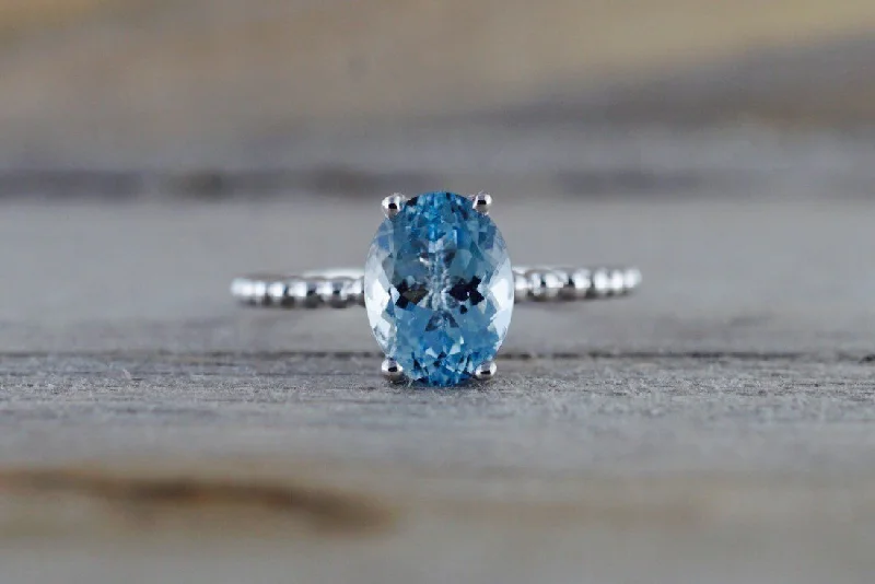 Men's polished brass rings with a warm glow14k White Gold Oval Cut Aquamarine Prong Engagement Promise Ring Rope Men's polished brass rings with a warm glow14k White Gold Oval Cut Aquamarine Prong Engagement Promise Ring Rope