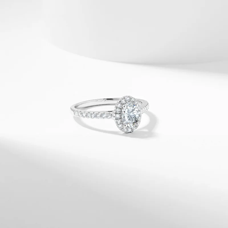 Princess - cut diamond engagement ring with a pavé - set band in platinumOval Moissanite Halo Engagement Ring 0.89tdw Princess - cut diamond engagement ring with a pavé - set band in platinumOval Moissanite Halo Engagement Ring 0.89tdw