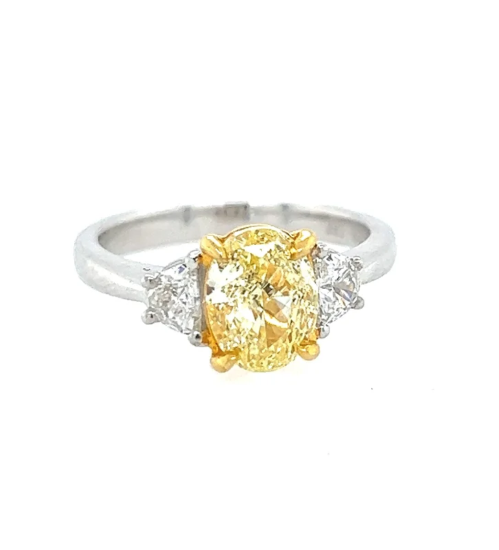 Solitaire diamond engagement ring with a platinum setting for a classic and elegant lookFancy Yellow Diamond Ring Solitaire diamond engagement ring with a platinum setting for a classic and elegant lookFancy Yellow Diamond Ring