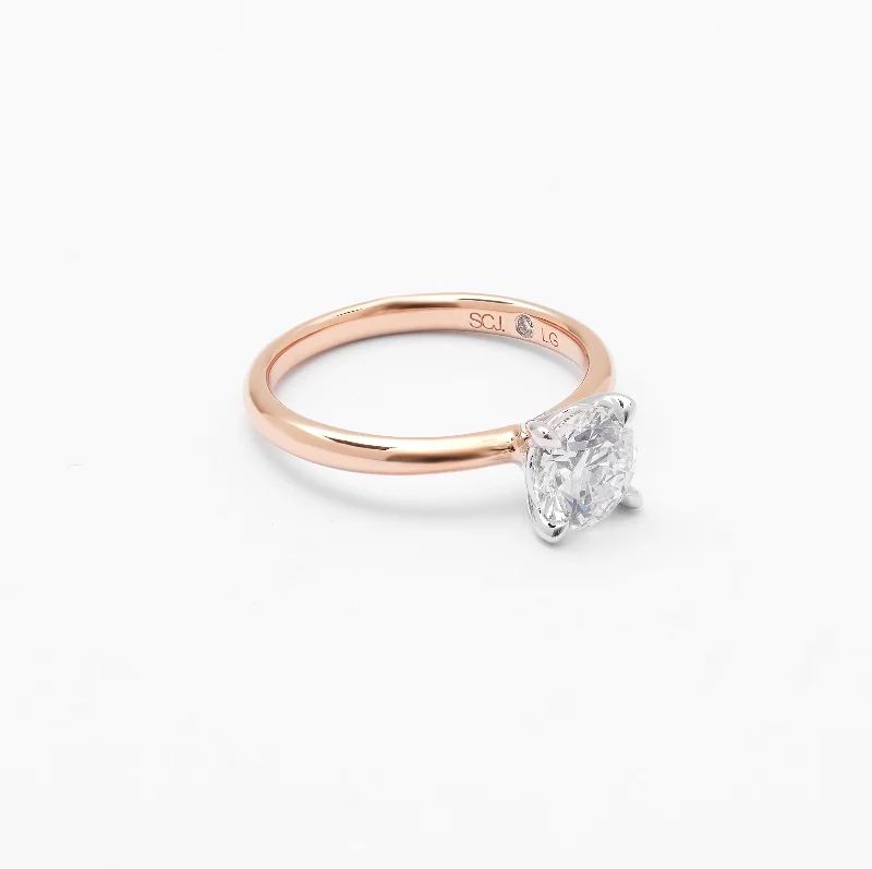 Heart - shaped diamond engagement ring with a hidden halo in 14K rose gold18K Rose And White Gold Round Brilliant Lab Diamond Solitaire Engagement Ring 1.25ct