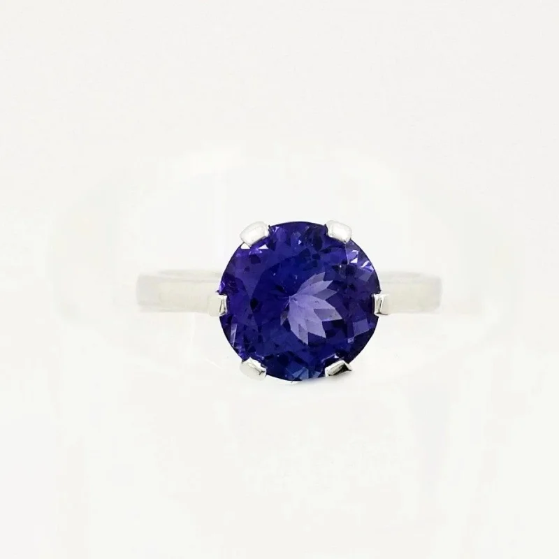 Tennis - Style Women's Rings with a Row of Round Diamonds in PlatinumWhite Gold Tanzanite Ring, Protea Design Tennis - Style Women's Rings with a Row of Round Diamonds in PlatinumWhite Gold Tanzanite Ring, Protea Design