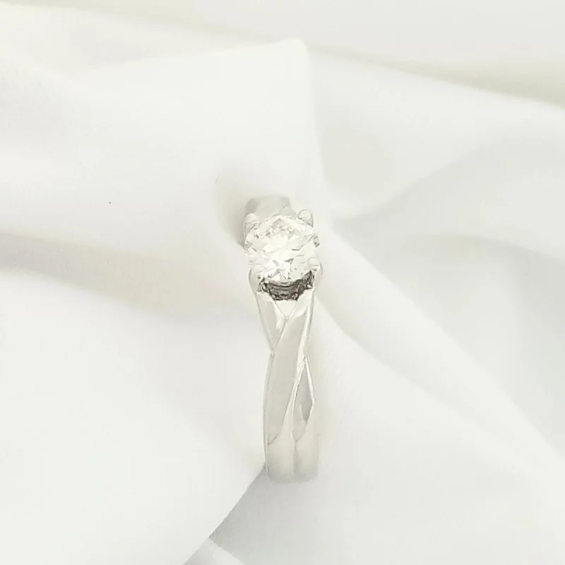 Women's 18K Gold Solitaire Diamond Ring for an Elegant Everyday LookWhite Gold Solitaire Cross Over Diamond Ring Women's 18K Gold Solitaire Diamond Ring for an Elegant Everyday LookWhite Gold Solitaire Cross Over Diamond Ring