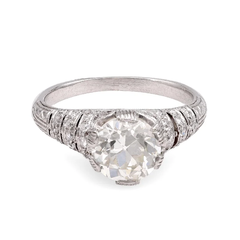 Princess - cut diamond engagement ring with a pavé - set band in platinumEdwardian-Inspired Platinum Diamond Ring Princess - cut diamond engagement ring with a pavé - set band in platinumEdwardian-Inspired Platinum Diamond Ring