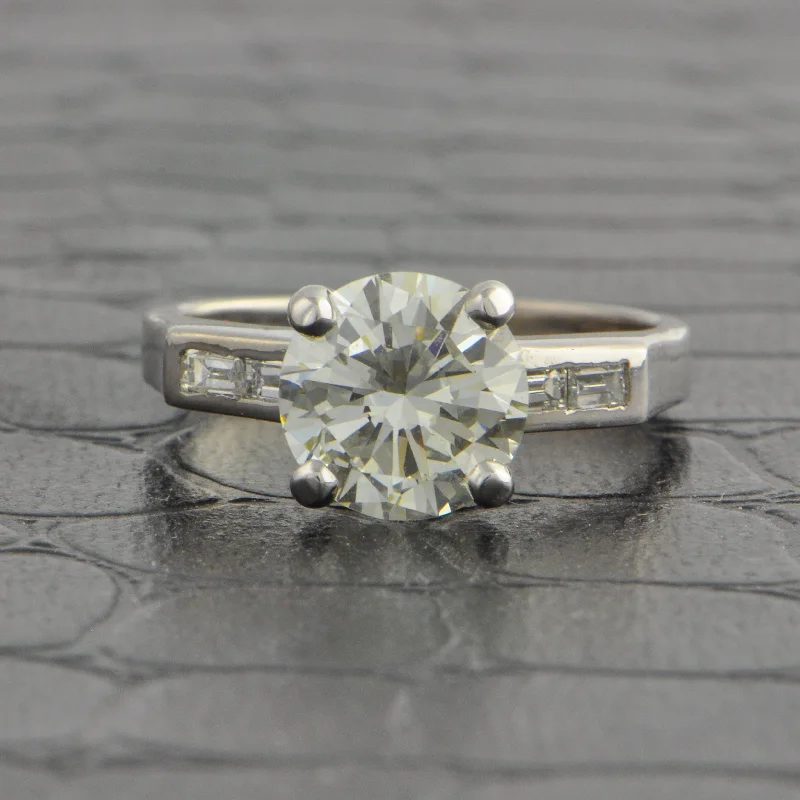 Three - stone diamond engagement ring in rose gold, symbolizing past, present, and futureGIA 2.15 ct. M-VS1 Diamond Engagement Ring in White Gold Three - stone diamond engagement ring in rose gold, symbolizing past, present, and futureGIA 2.15 ct. M-VS1 Diamond Engagement Ring in White Gold